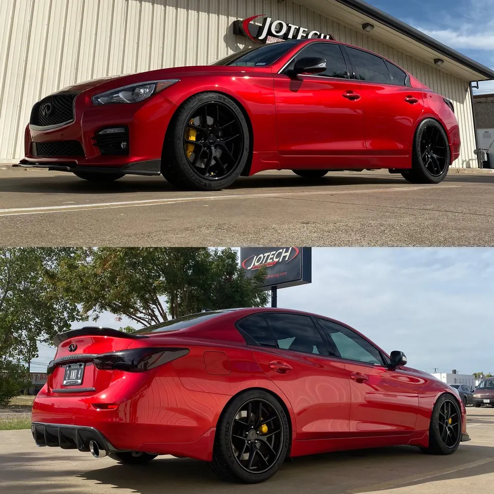 Red Infiniti Q50 sedan with black aftermarket wheels, yellow brake calipers, and an aggressive aero kit parked outside Jotech Motorsports.