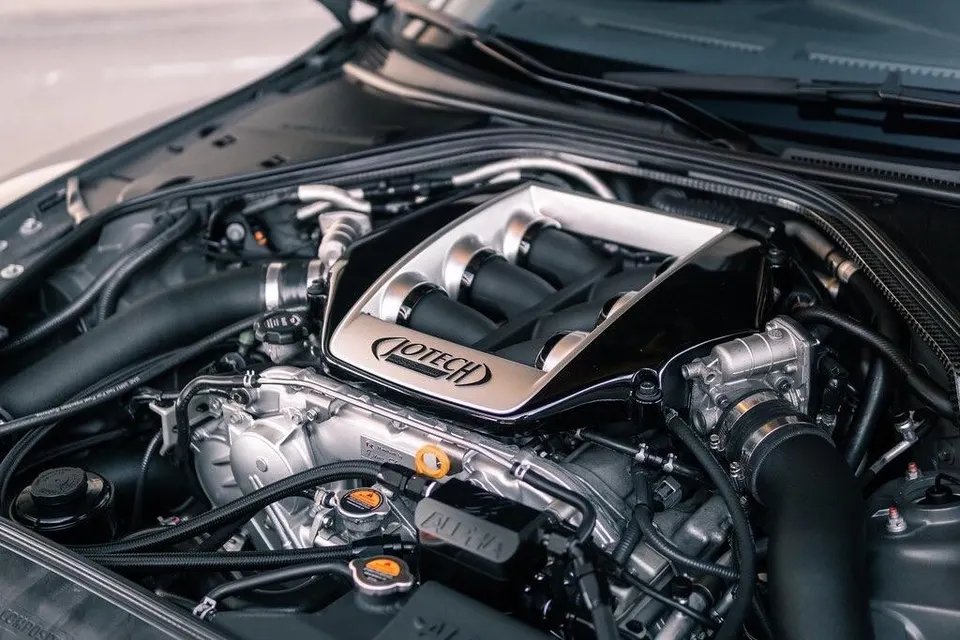Close-up of a Jotech-tuned Nissan GT-R VR38DETT engine bay featuring a custom intake manifold.