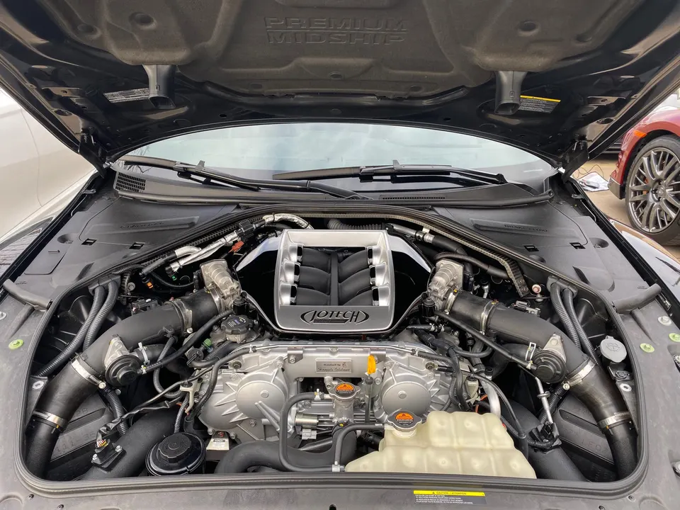 Close-up view of a Jotech-tuned Nissan GT-R VR38DETT engine bay with custom intake manifold and induction system.
