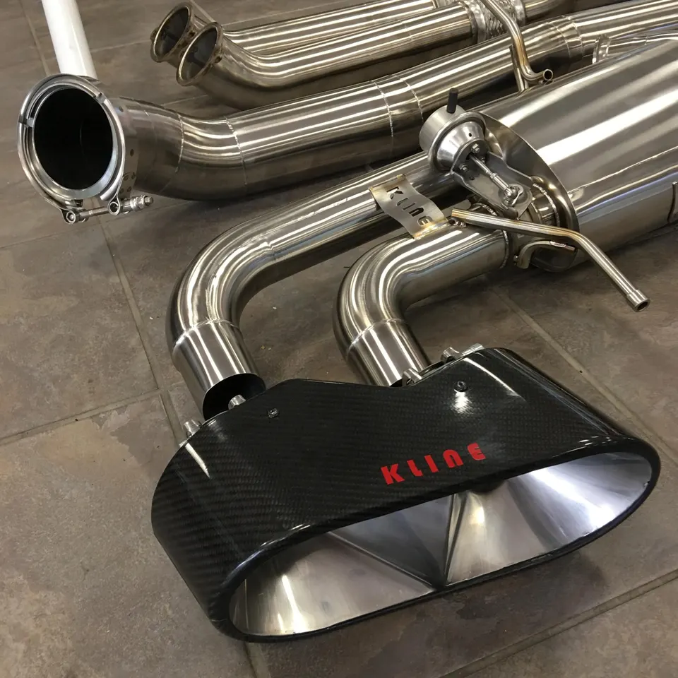 Kline Innovation stainless steel exhaust system with carbon fiber tips and muffler for a performance vehicle