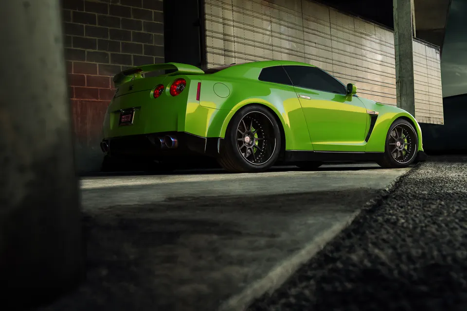 A bright green Nissan GT-R with custom black wheels and aftermarket exhaust parked in an urban setting.