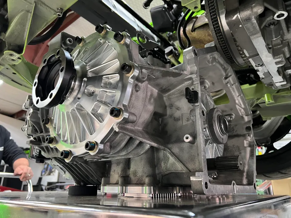 Close-up of a high-performance transmission or transaxle being prepared for installation at Jotech Motorsports.