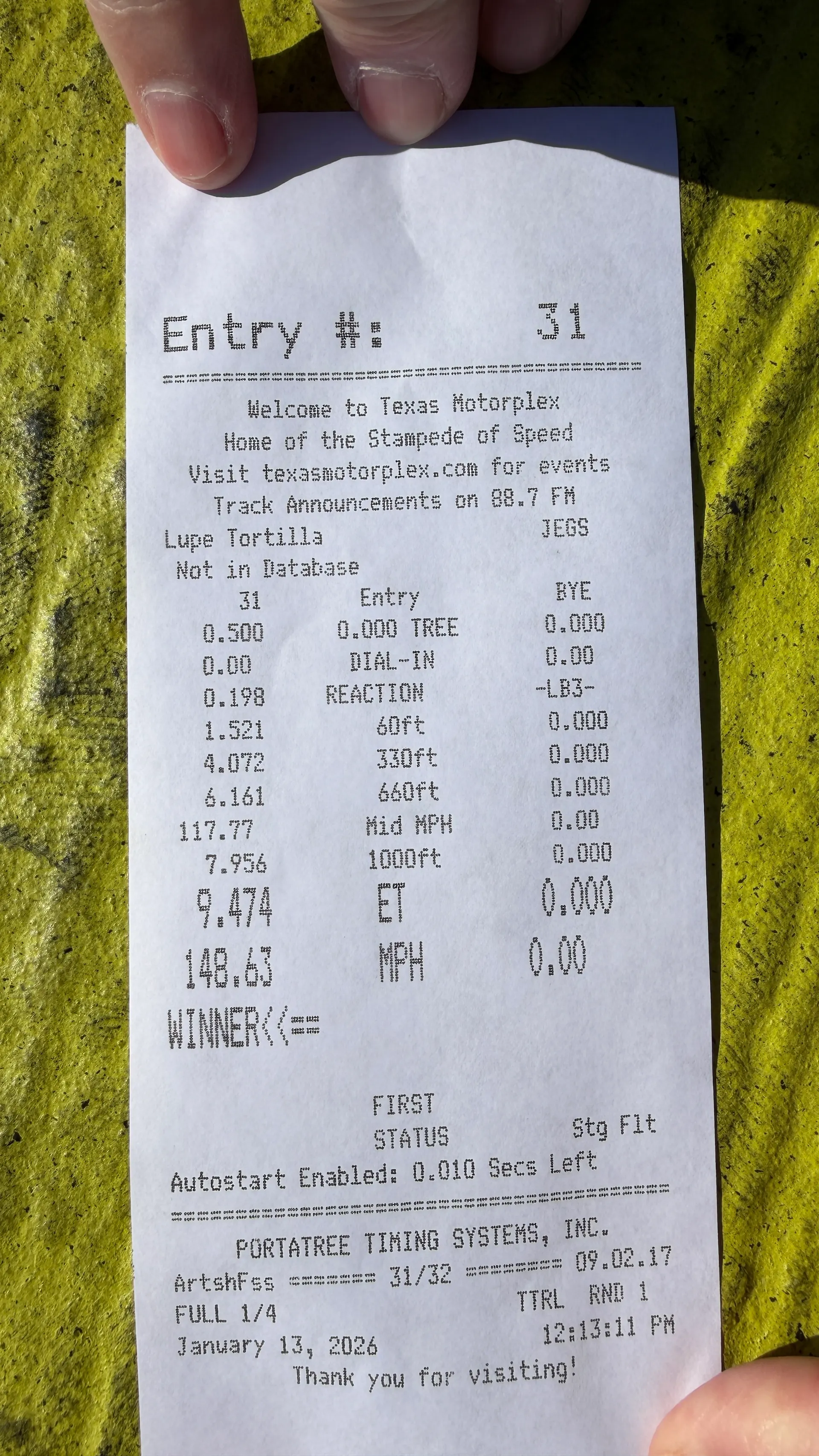 A close-up of a drag racing time slip from Texas Motorplex showing a 9.474 ET at 148.63 MPH.