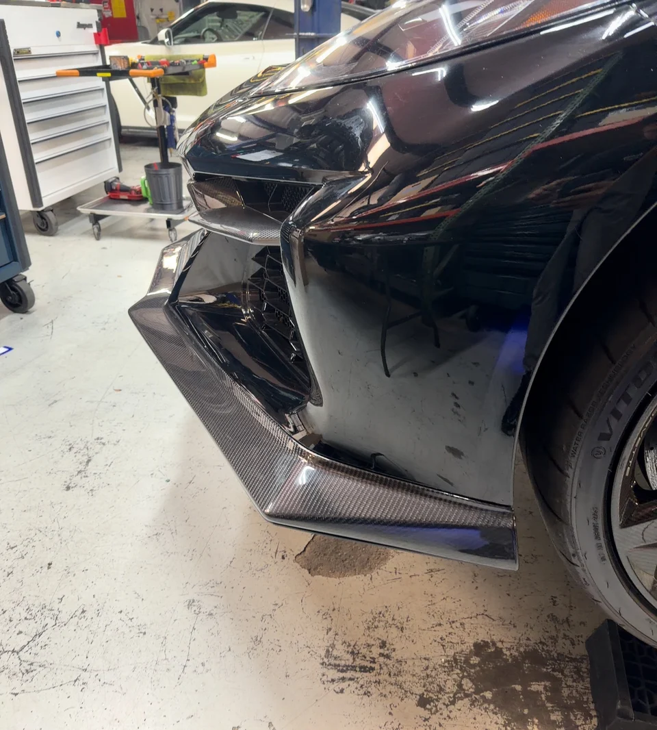 A closer look at the installed APR Carbon Fiber Front Splitter on your C8 Z06.