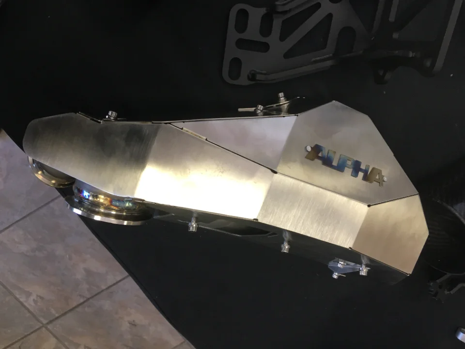 Alpha Performance fabricated metal intake manifold for a high-performance vehicle.