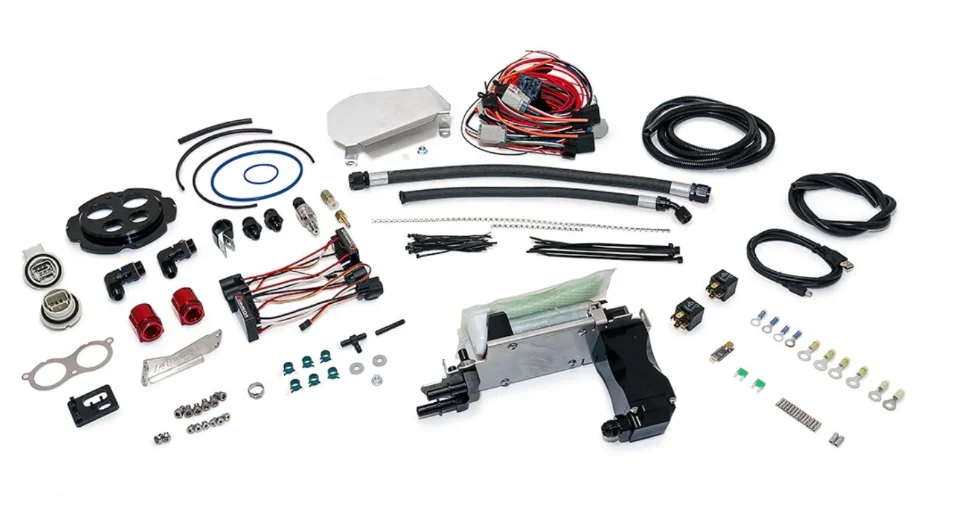 A comprehensive kit of performance fuel system components including a fuel pump, lines, fittings, and wiring harness.